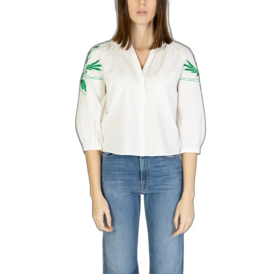 Desigual women shirt featuring a woman in white with green embroidery